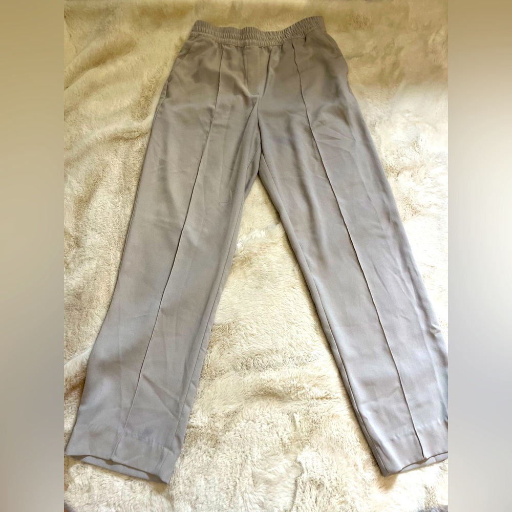 Pleated tan business woman pants with pockets